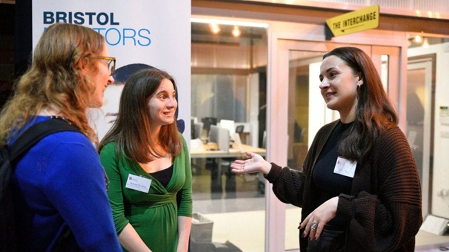 Students talking at a Bristol Mentors event